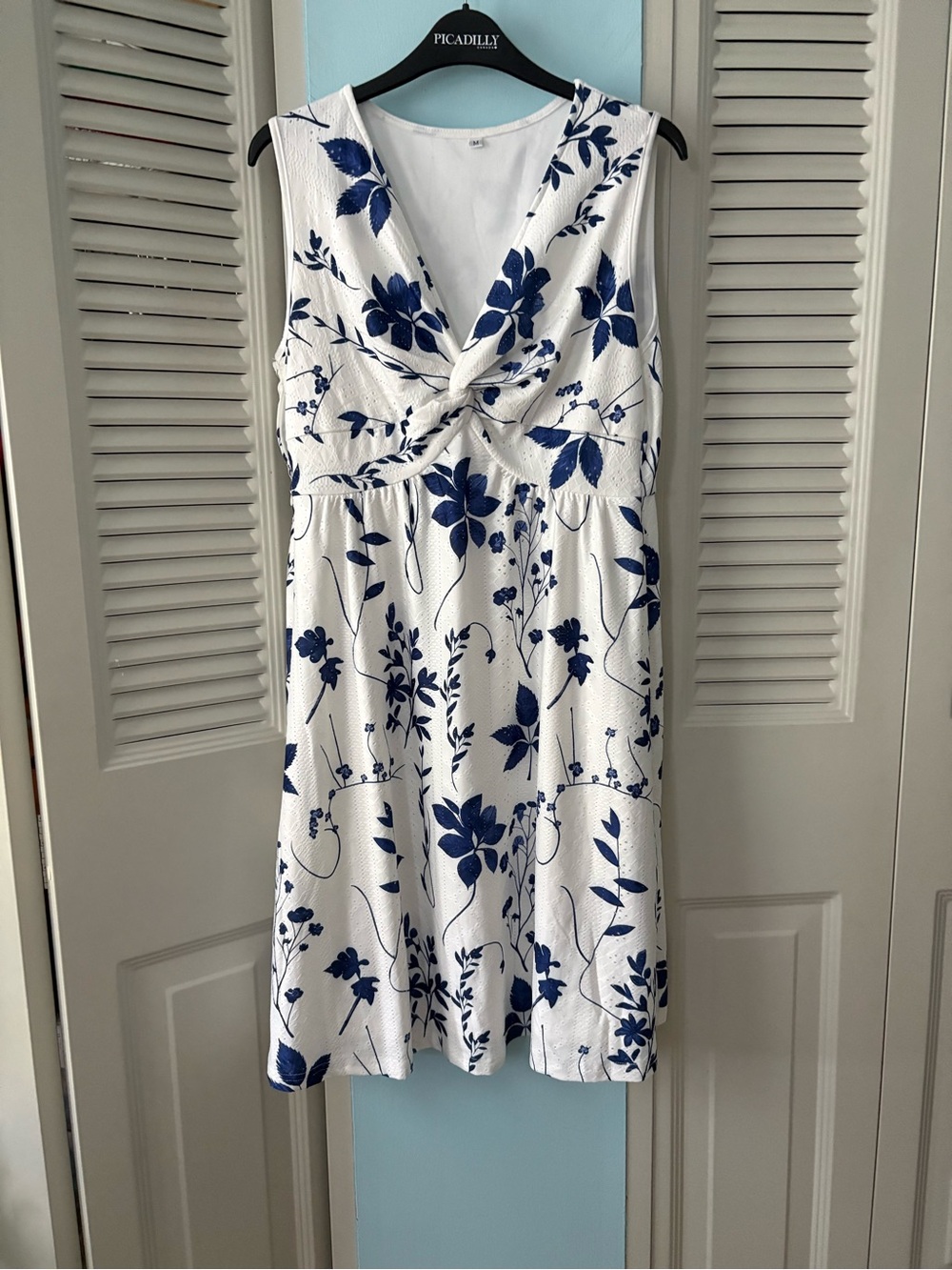 New pretty blue and white pattern twist front dress